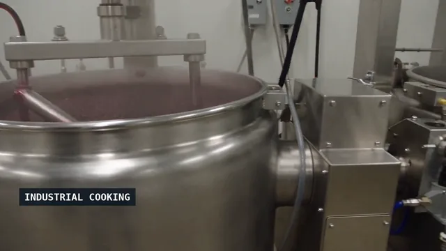 Stainless-steel industrial cooking vessel