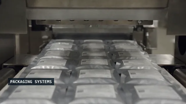 Pouches moving through an industrial packaging machine